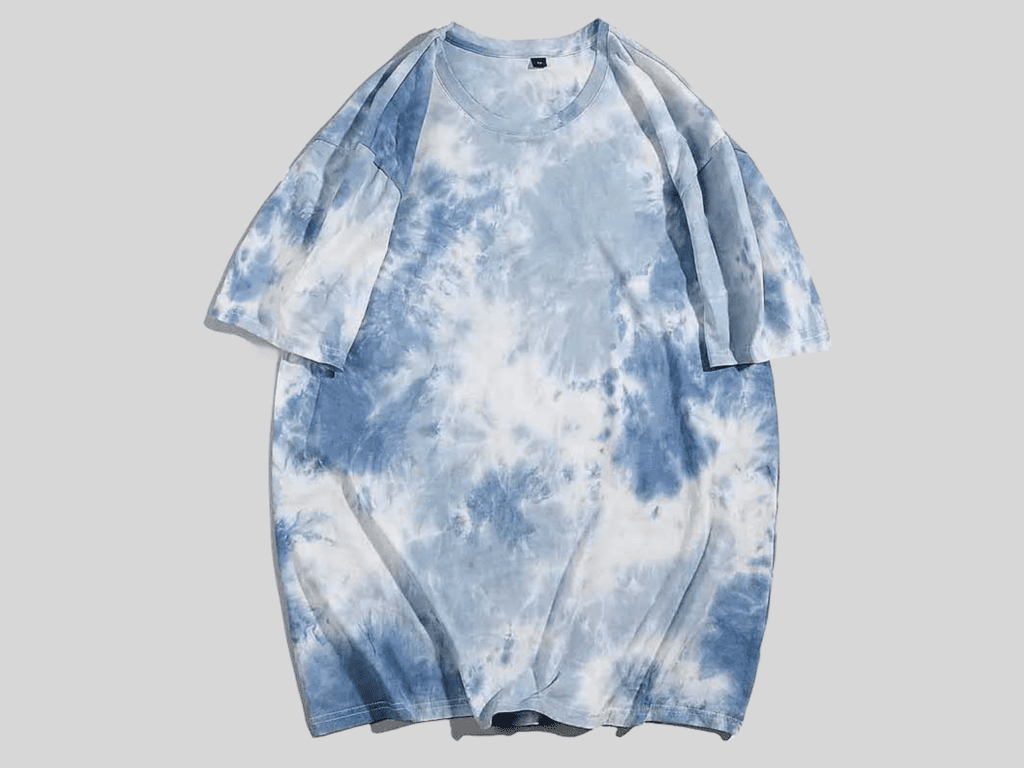 Tie-dye involves binding fabric and applying dye to create distinctive patterns, especially on t-shirts. This method allows for various designs, from simple spirals to complex patterns, by folding and tying the fabric before dyeing. The bound areas resist dye, forming unique designs, making it a popular method for customizing casual apparel.