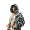 A woman is playing in a shark camouflage bape hoodie