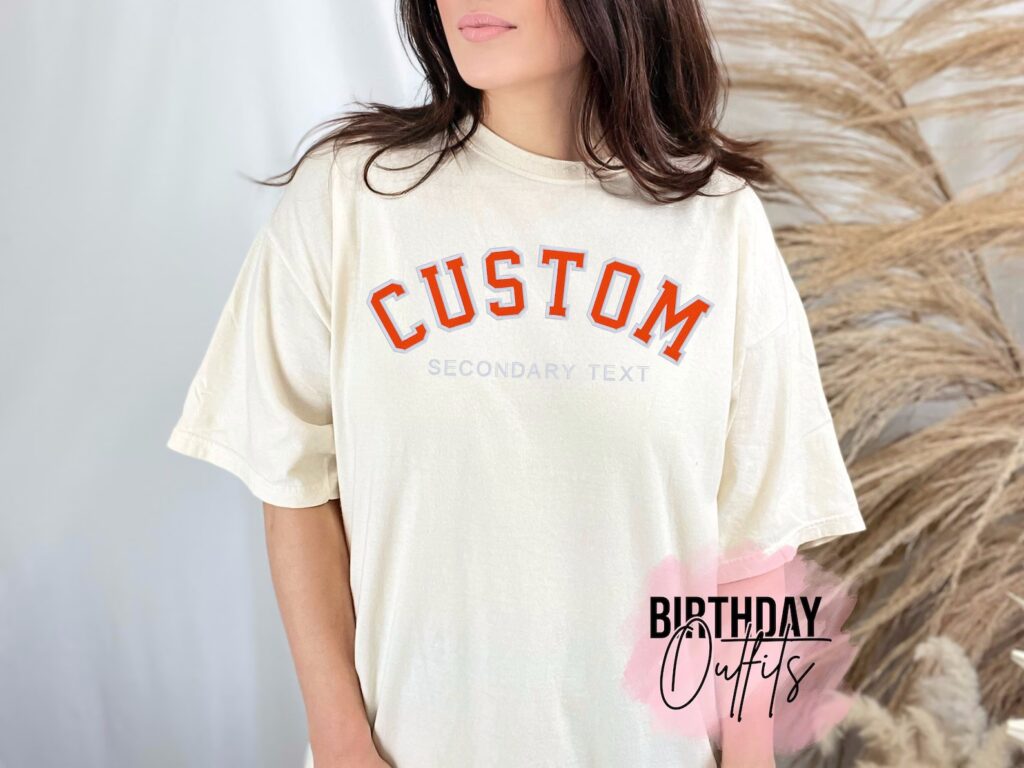 A female model wears an embroidered white T-shirt