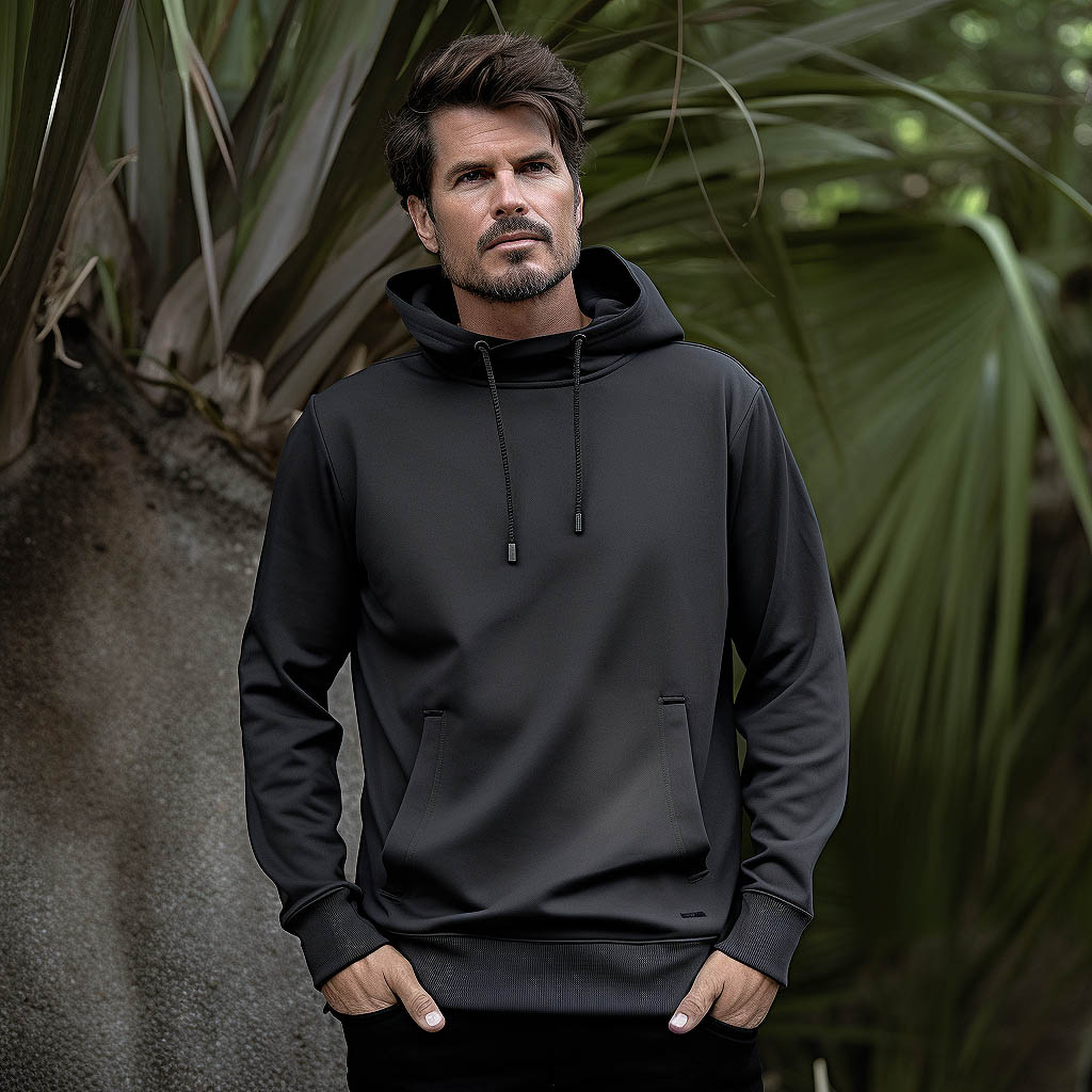 A man wearing Stretch Fabrics Men's hooded sweatshirt made of fabric