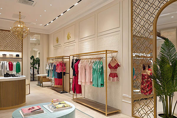 Luxurious store showcasing vibrant resort wear and lingerie.