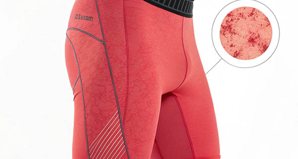 Red compression shorts with textured pattern and stripe accents.