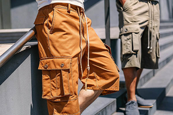 Men wearing brown and olive cargo shorts with multiple pockets.