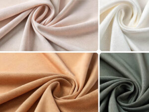 Soft fabric swatches in beige, cream, peach, and sage green, artistically twisted.