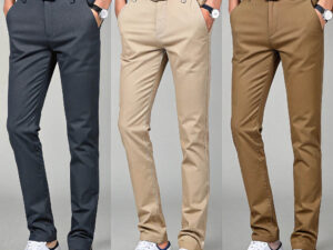 Three models wearing slim-fit chino pants in black, beige, and brown, paired with watches and sneakers.