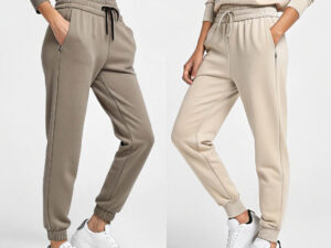 Two models wearing fitted jogger pants in taupe and beige, paired with sneakers.