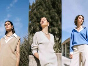Three women modeling cozy layered outfits in outdoor sunlight.
