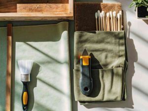 Fabric tools and green cloth under sunlight