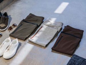 Folded joggers in brown, grey, olive with casual sneakers.