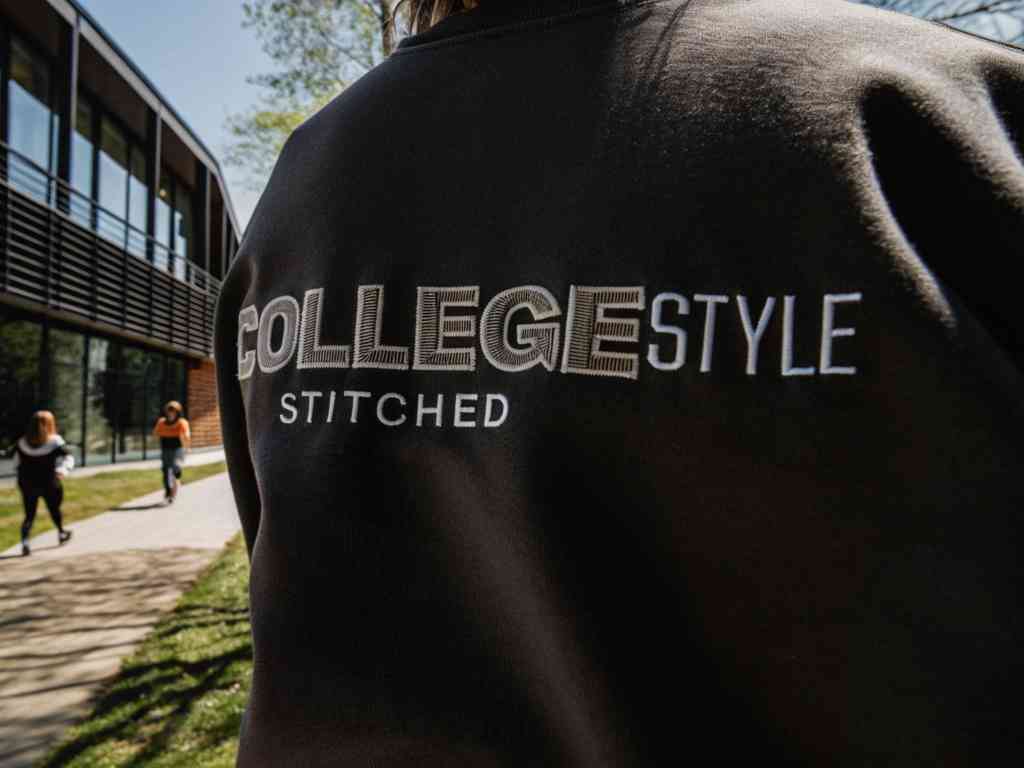 Black sweatshirt with stitched 'COLLEGE STYLE' embroidery on back