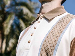 Cream retro polo with tan honeycomb knit stripes.