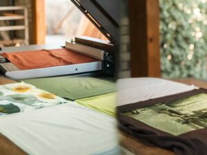 Shirts with colorful and artistic patterns in fabric printing machine.