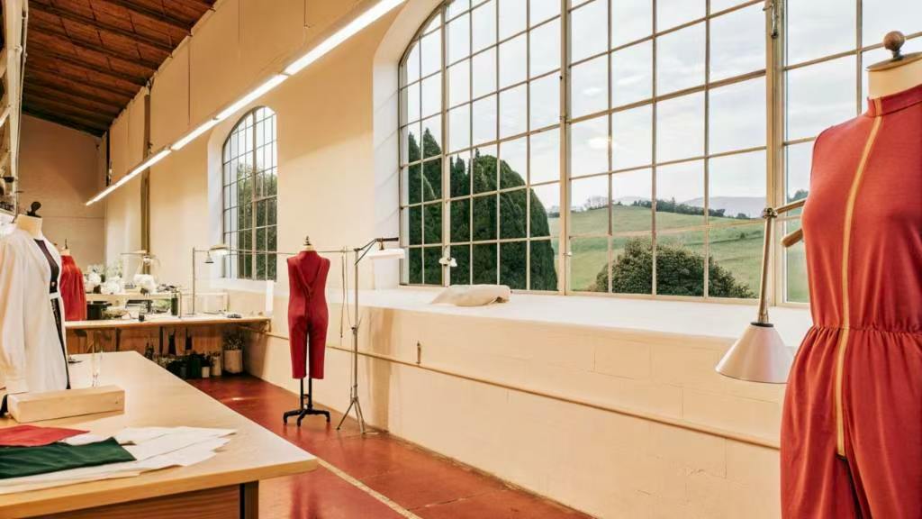 Mannequins and fabrics in a bright fashion studio