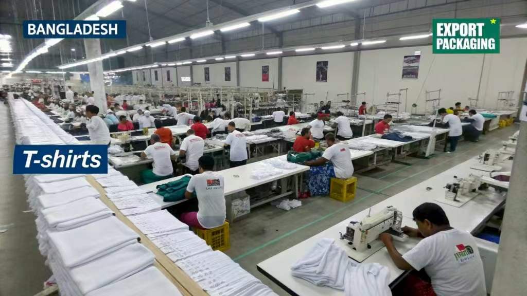 Workers sewing and assembling T-shirts in a garment factory.
